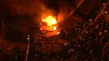 Minneapolis police station on fire as protests gro...