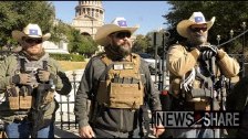 Armed militiamen protest in front of TX capitol in...