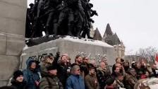 Veterans remove barriers from Ottawa War Memorial ...