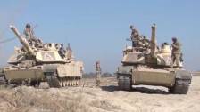 M1 Abrams Tanks and Bradley Fighting Vehicles in C...