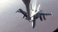 KC-135 Provides Aerial Refueling for F-18s