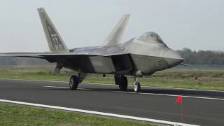 F-22 Raptors of 1st Fighter Wing Fly into Kleine-B...