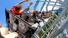 Riding Twisted Cyclone Roller Coaster at Six Flags...
