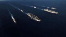 Aerial Video of Dual Carrier Strike Groups Sailing...